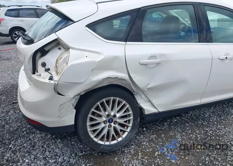 2014 Ford Focus Titanium из США, поврежденный, VIN 1FADP3N25EL396091